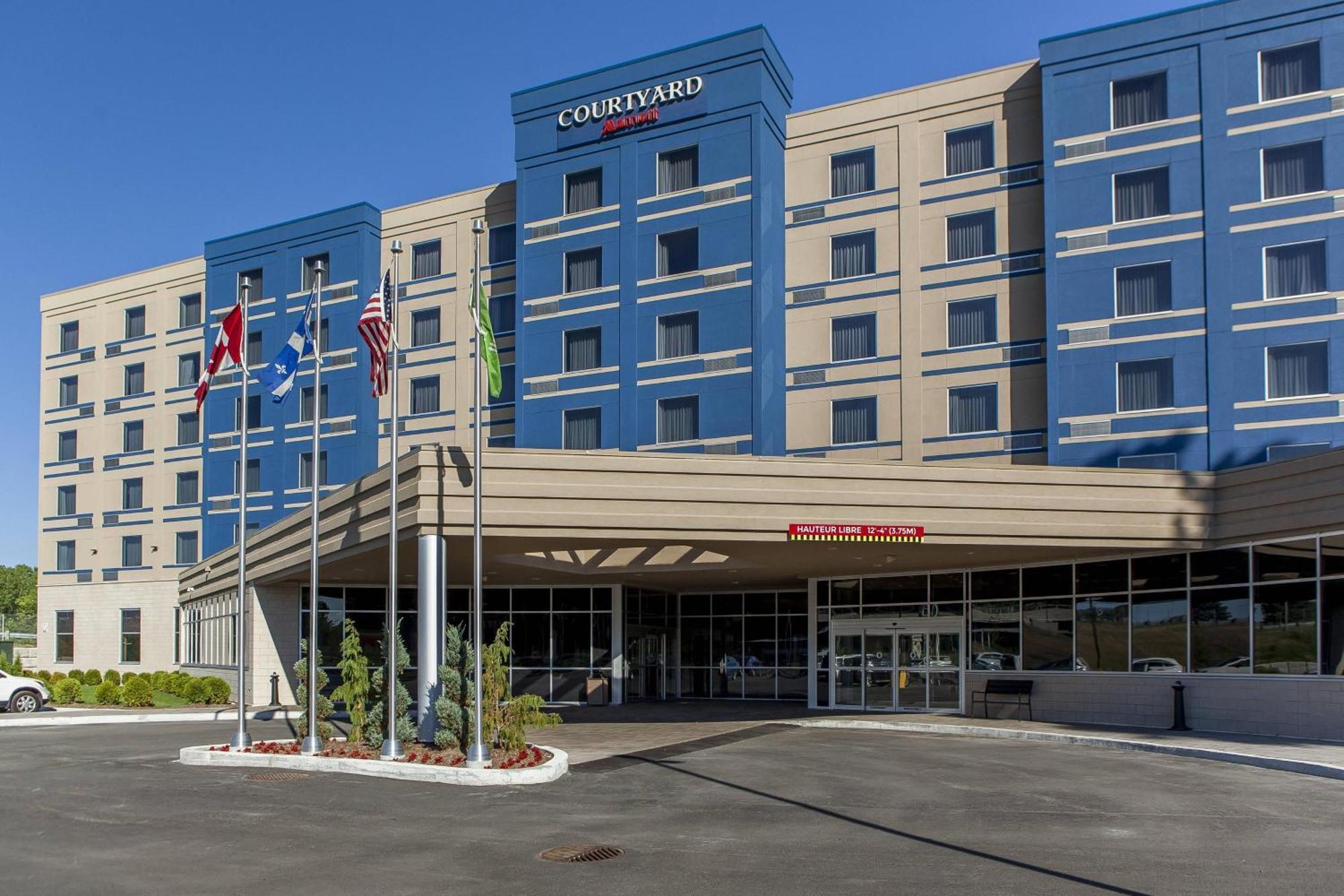 คอร์ตยาร์ด บาย แมริออท เวสต์ ไอส์แลนด์/แบดูร์ฟ Hotel Baie D'Urfe ภายนอก รูปภาพ